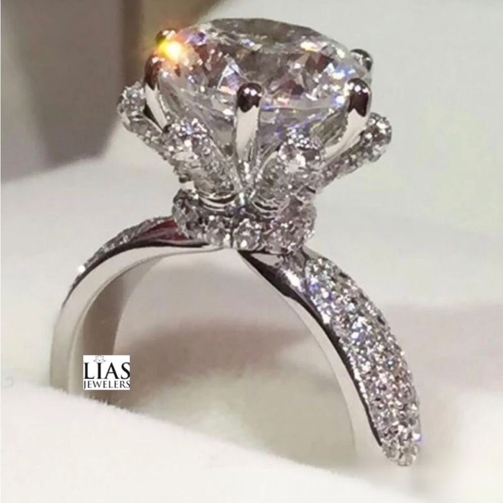 New 18k white gold engagement ring